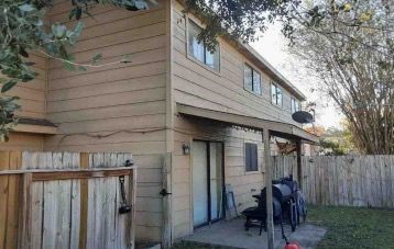 10113 Spring Pl Drive Houston, TX 77070 - Photo 10 of 11 a view of back yard of the house