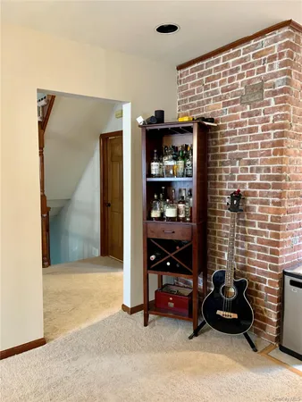 a view of livingroom with furniture and stairs