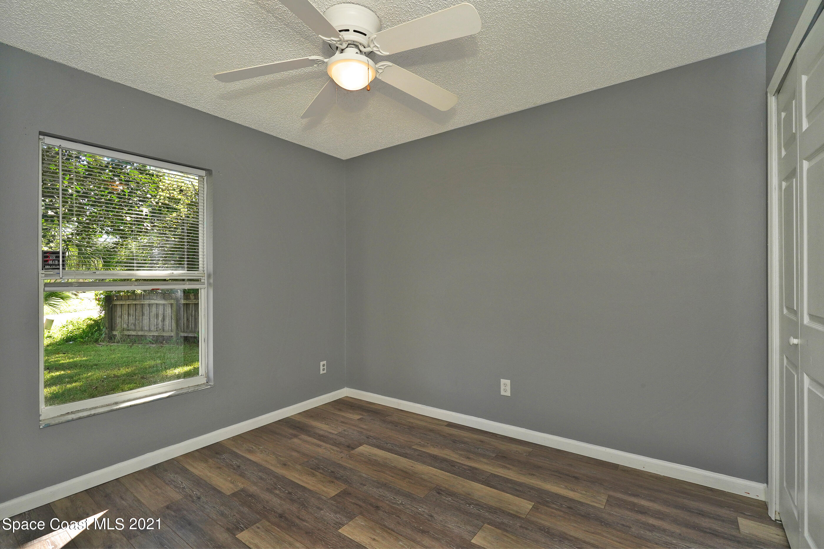905 Macco Road Cocoa, FL 32927 - Photo 14 of 27 an empty room with a window