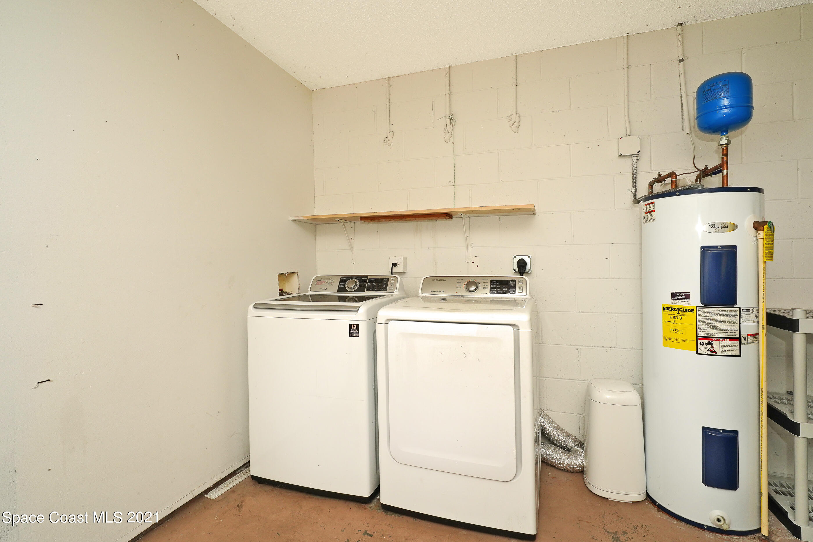 905 Macco Road Cocoa, FL 32927 - Photo 16 of 27 a utility room with dryer and washer