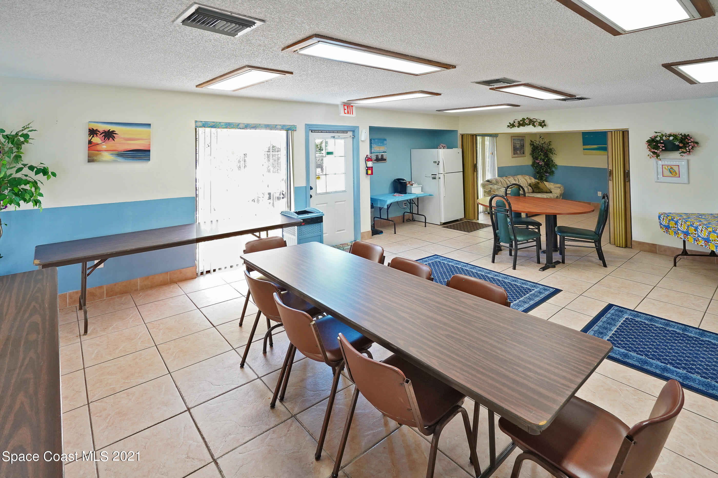 905 Macco Road Cocoa, FL 32927 - Photo 27 of 27 a dining room with furniture and wooden floor