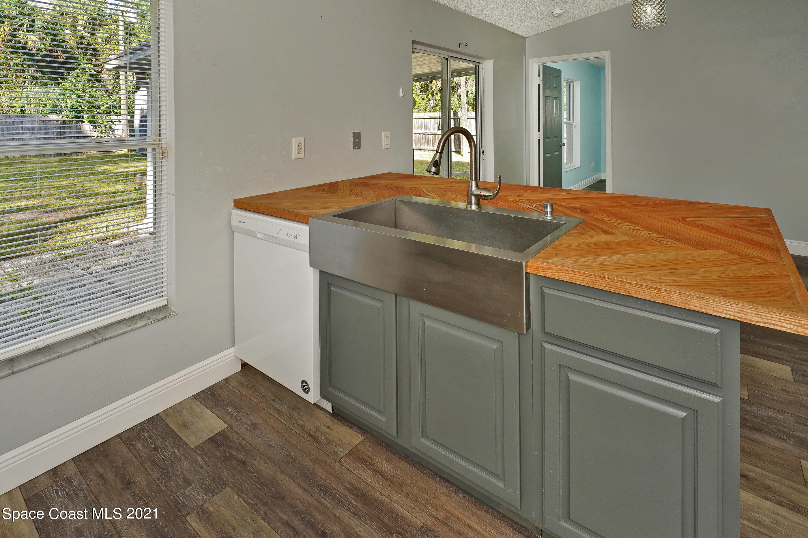 905 Macco Road Cocoa, FL 32927 - Photo 9 of 27 a room with storage and utility