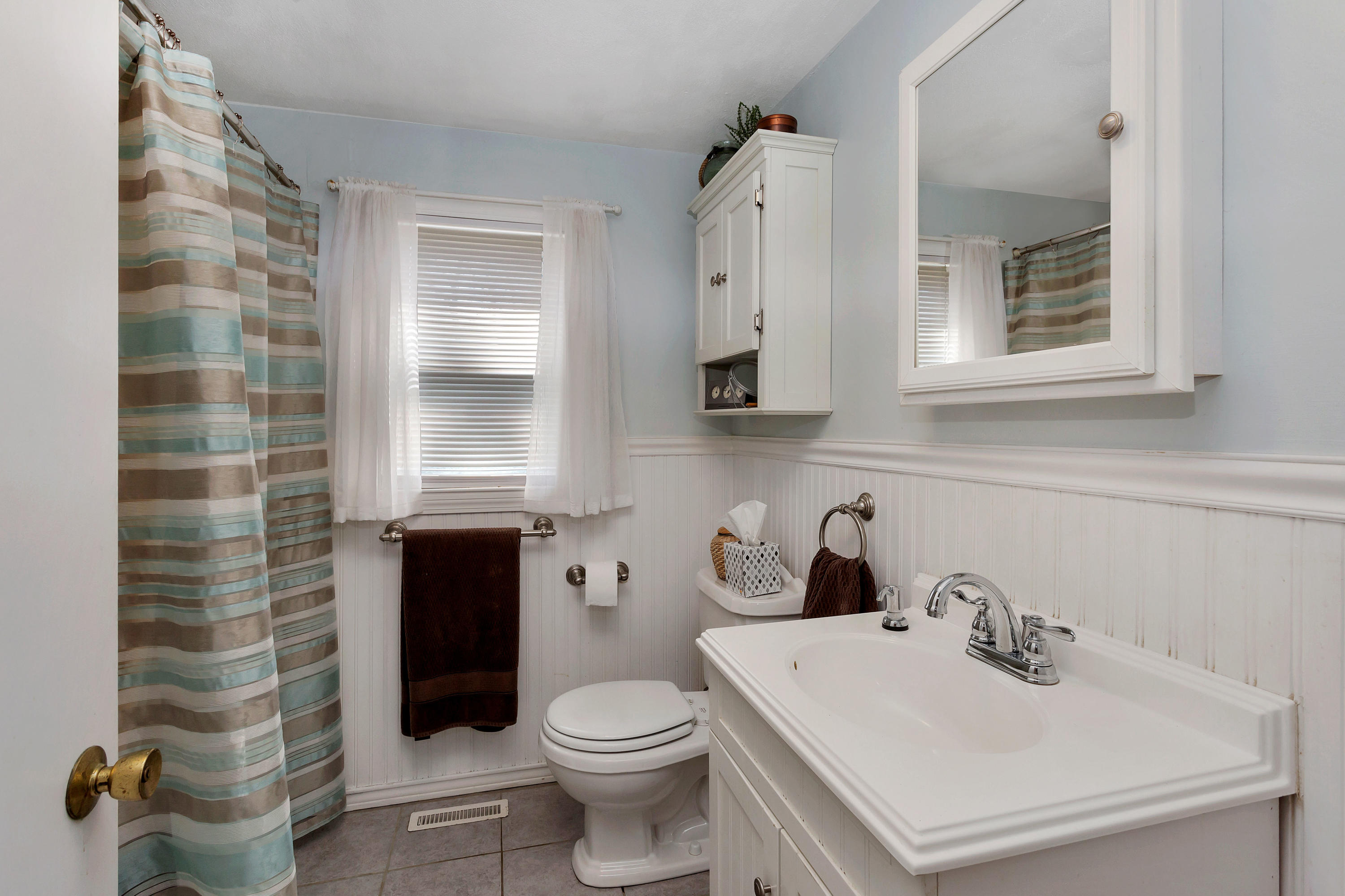 36 Scituate Road Mashpee, MA 02649 - Photo 18 of 36 a bathroom with a sink toilet and mirror