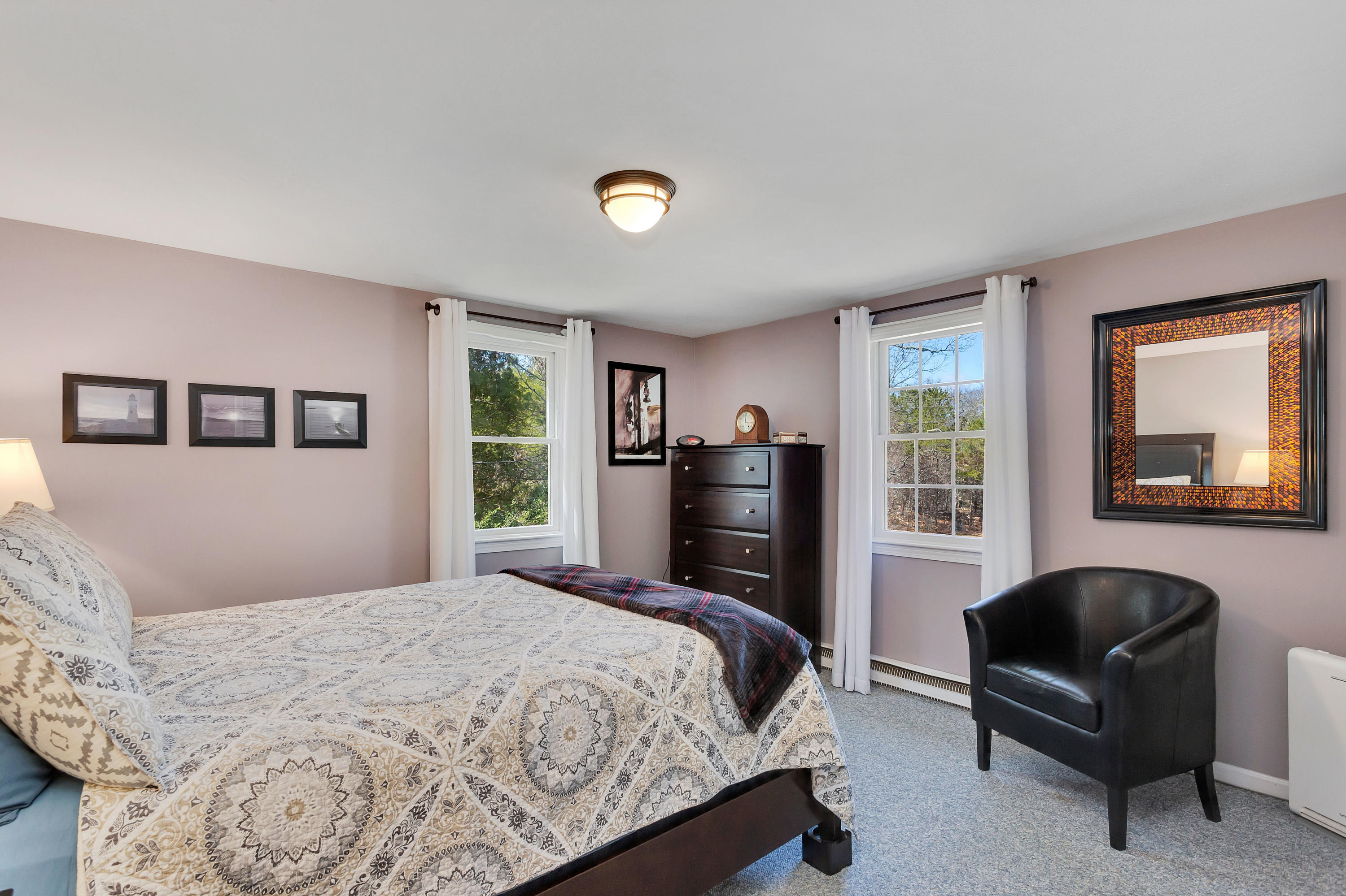 36 Scituate Road Mashpee, MA 02649 - Photo 19 of 36 a bedroom with a bed and a couch