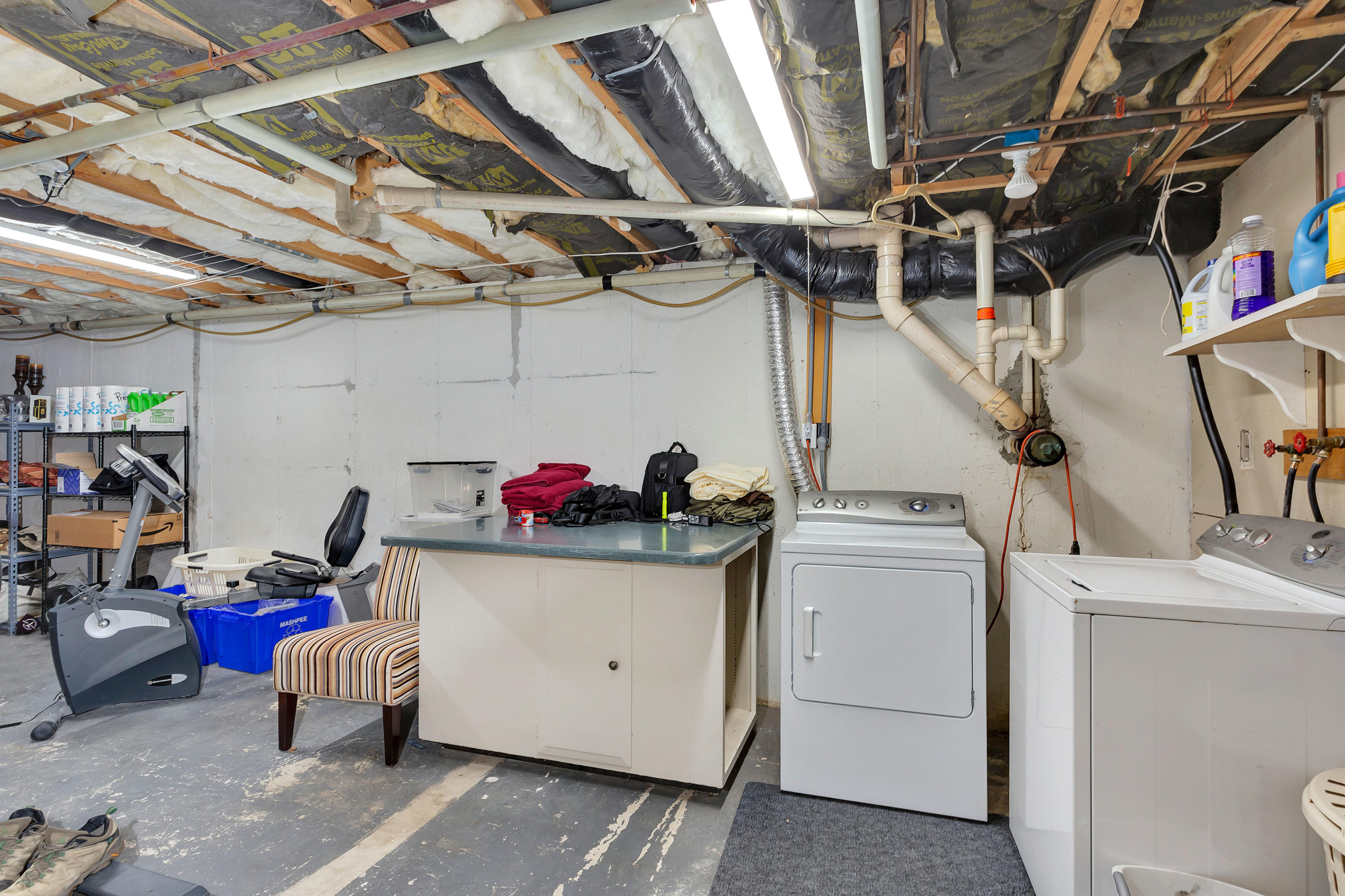 36 Scituate Road Mashpee, MA 02649 - Photo 25 of 36 a storage room with storage and utility