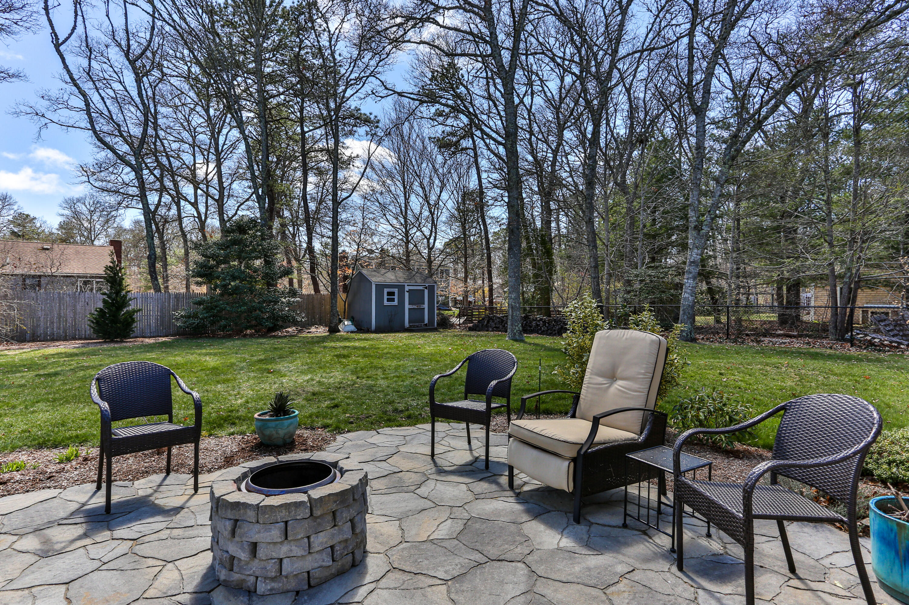 36 Scituate Road Mashpee, MA 02649 - Photo 26 of 36 a garden view with a seating space and garden