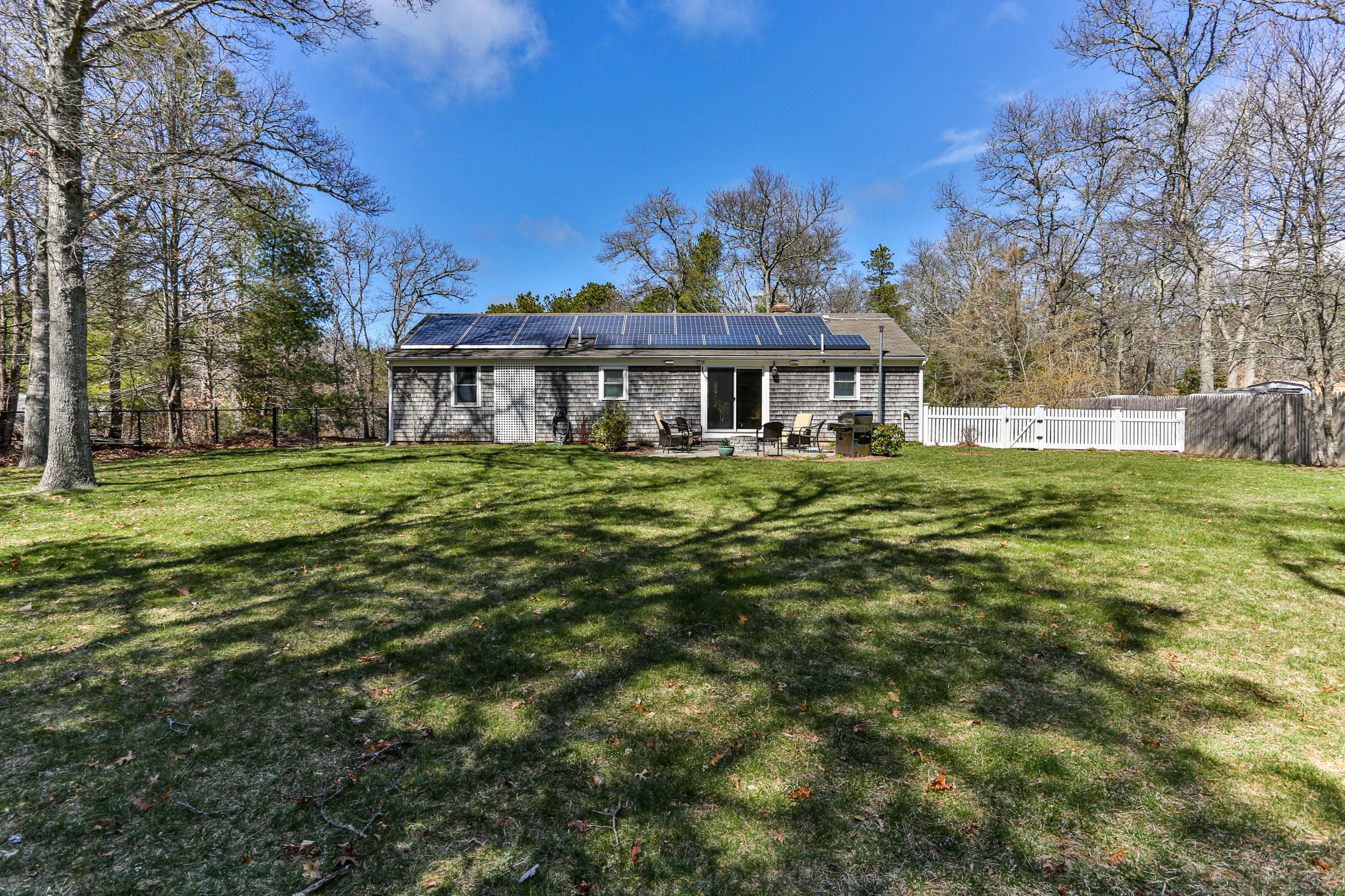 36 Scituate Road Mashpee, MA 02649 - Photo 30 of 36 a view of a house with a big yard