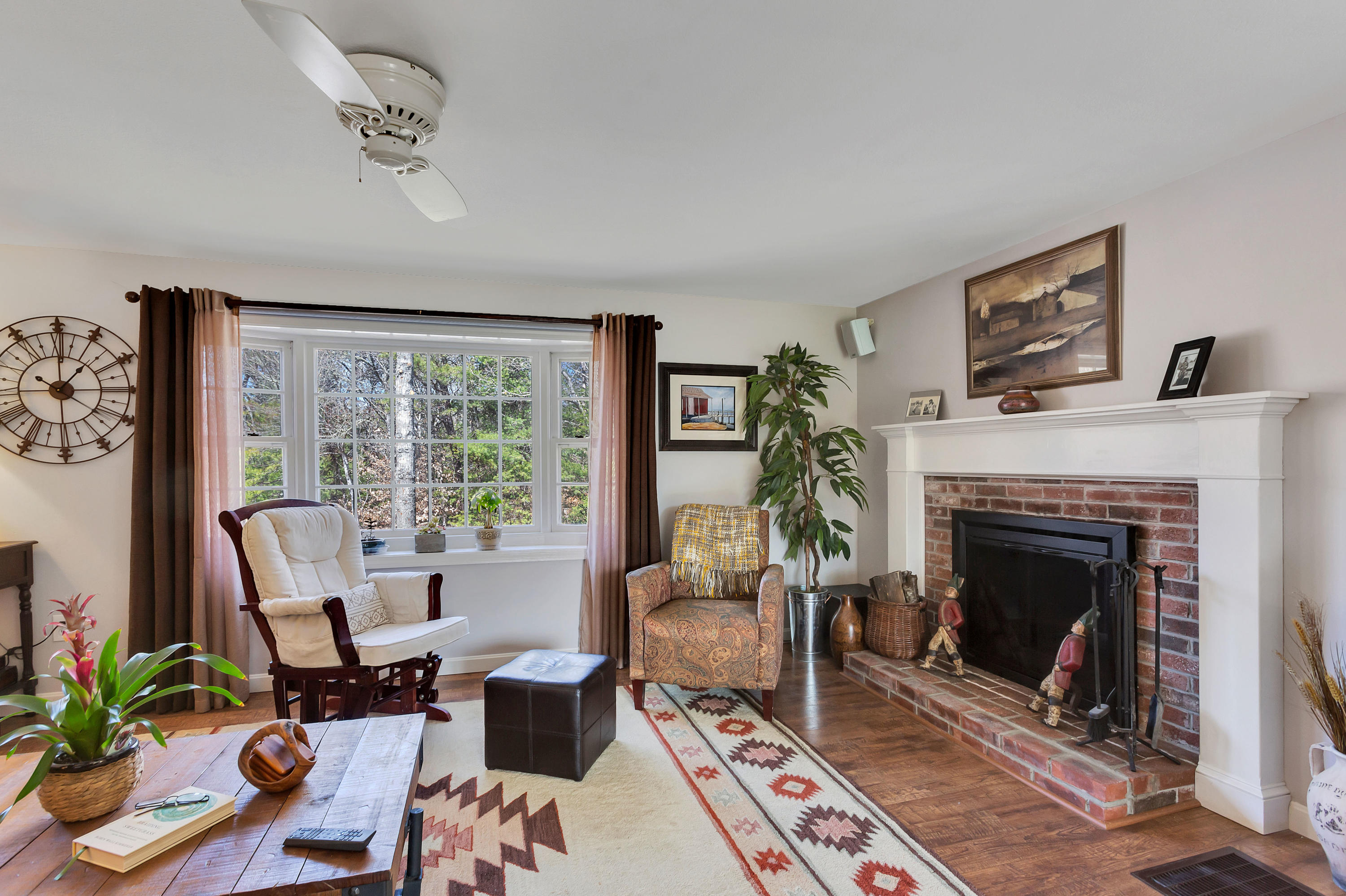 36 Scituate Road Mashpee, MA 02649 - Photo 6 of 36 a living room with furniture and a fireplace