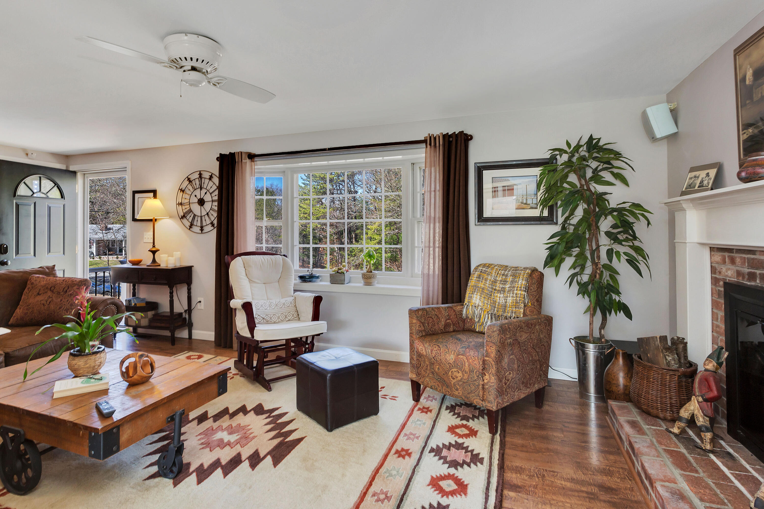 36 Scituate Road Mashpee, MA 02649 - Photo 7 of 36 a living room with furniture and a potted plant