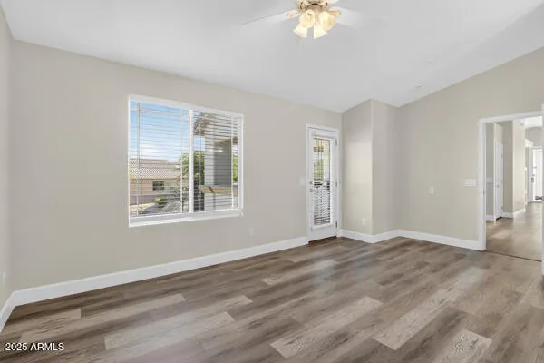 a view of an empty room with a window