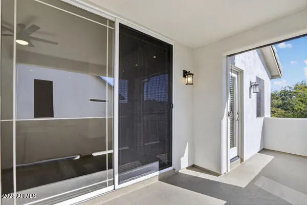 a view of a bathroom with a glass door shower