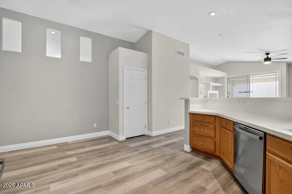 a spacious bathroom with a sink and a mirror