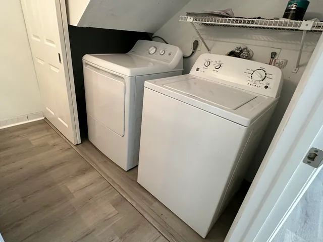 a utility room with dryer and washer