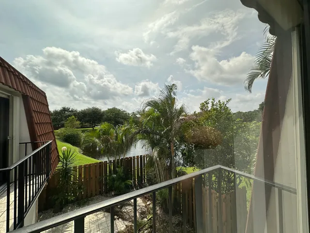 a view of a balcony with an outdoor space