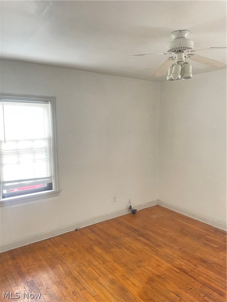 3645 Winchell Road Shaker Heights, OH 44122 - Photo 18 of 37 Unfurnished room with ceiling fan and hardwood / wood-style flooring