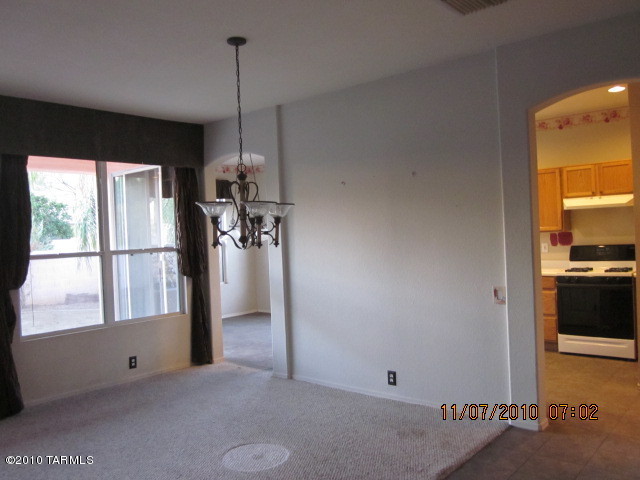 9920 North Stratton Saddle Trail Tucson, AZ 85742 - Photo 6 of 10 a view of a room with window