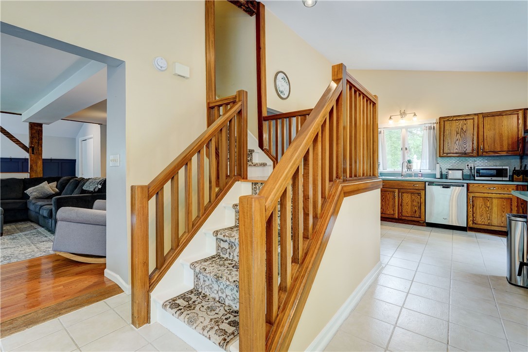1990 Penfield Road Penfield, NY 14526 - Photo 17 of 44 Stairs lead to 2 more bedrooms & full bath.