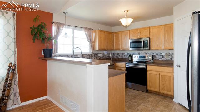 7063 Red Cardinal Loop Colorado Springs, CO 80908 - Photo 9 of 36 Gallery Image 9