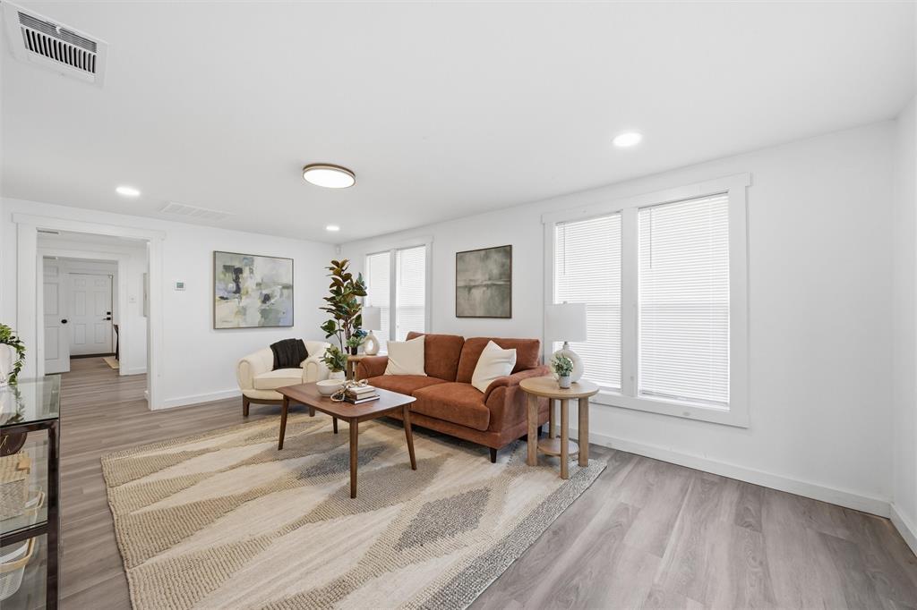 1116 Houston Street Waco, TX 76704 - Photo 3 of 16 Living room with light wood-style flooring and recessed lighting