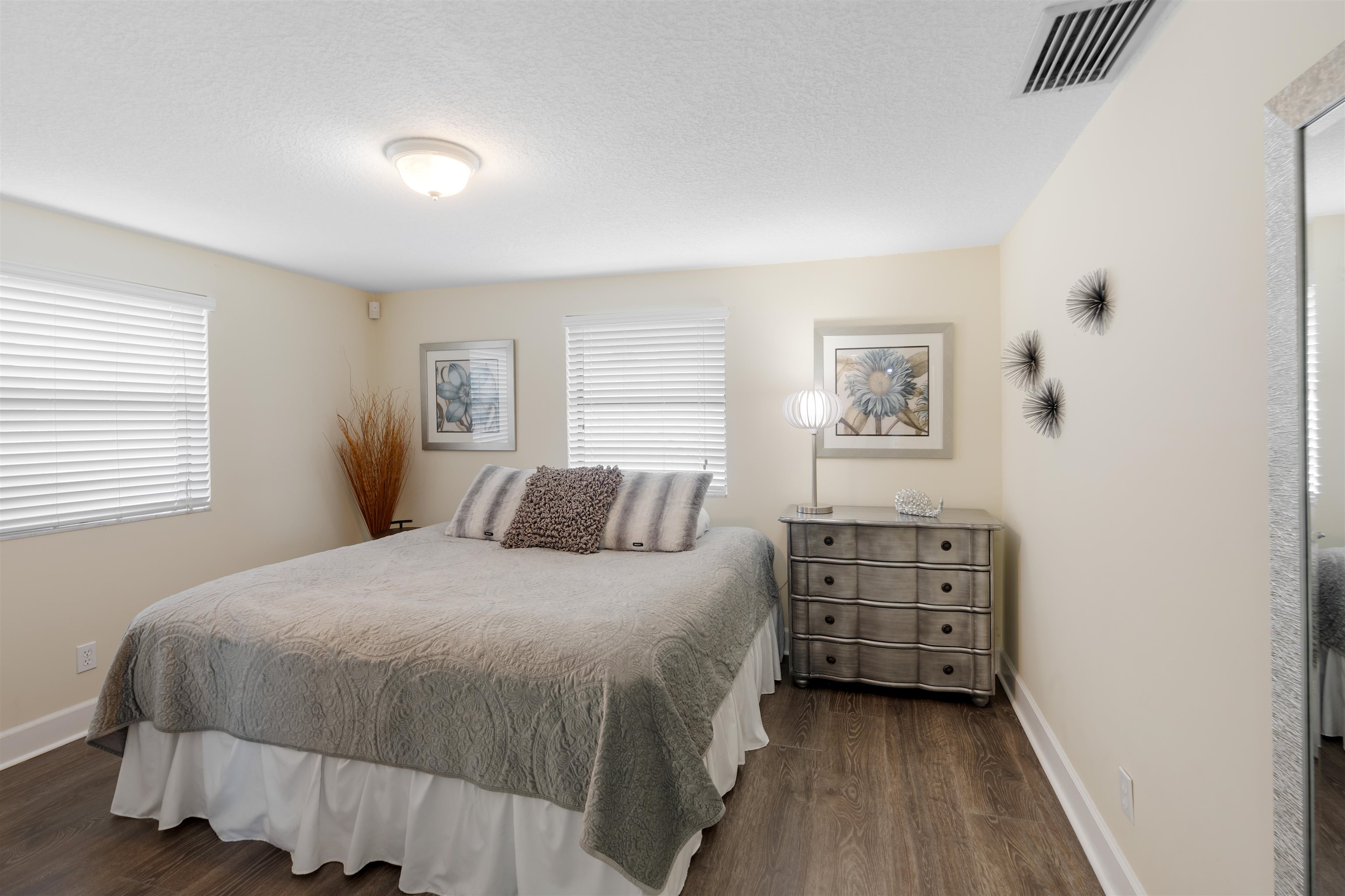 5424 Atlantic View St. Augustine, FL 32080 - Photo 20 of 42 a bedroom with a bed and a window