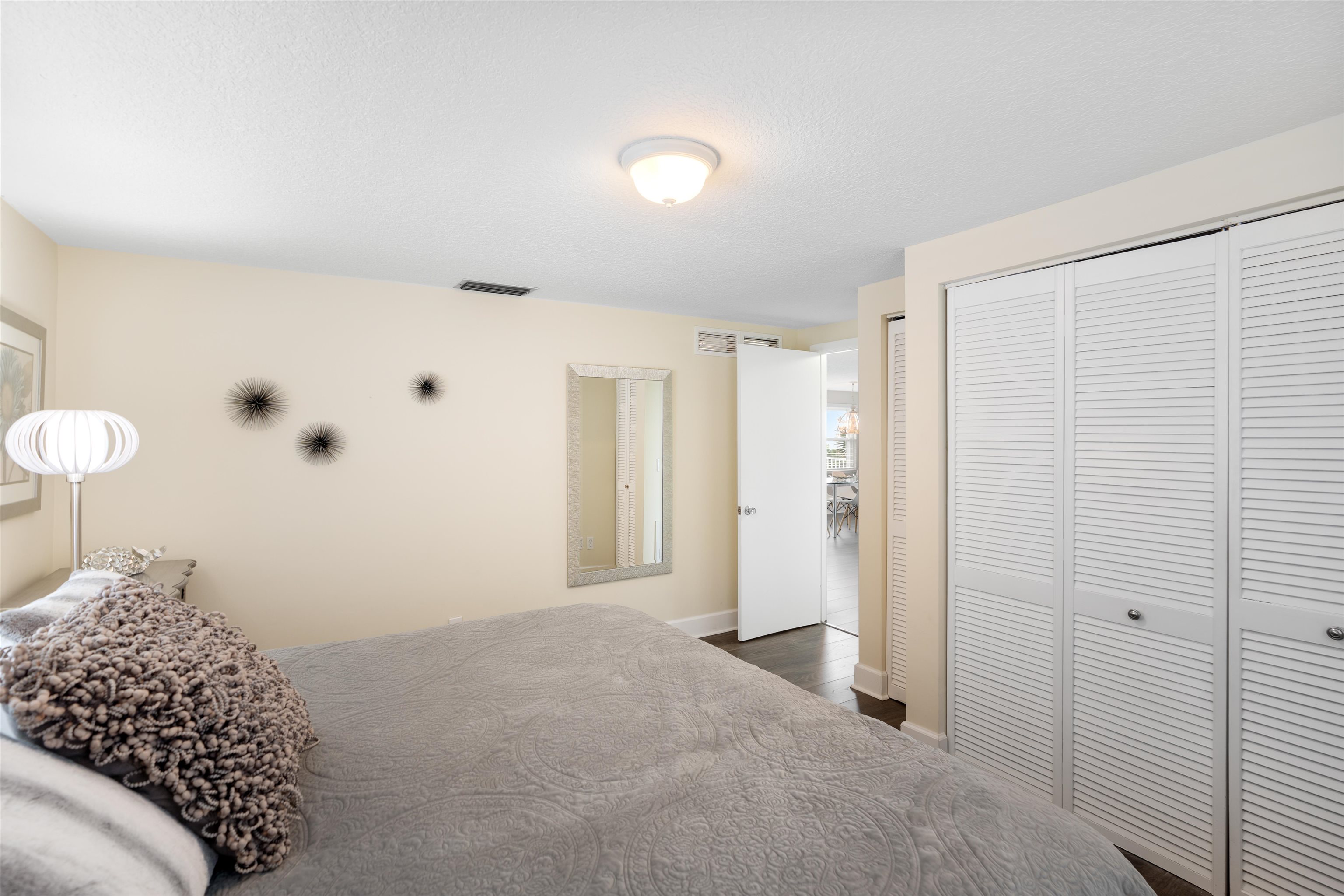 5424 Atlantic View St. Augustine, FL 32080 - Photo 22 of 42 a bedroom with a bed and a closet