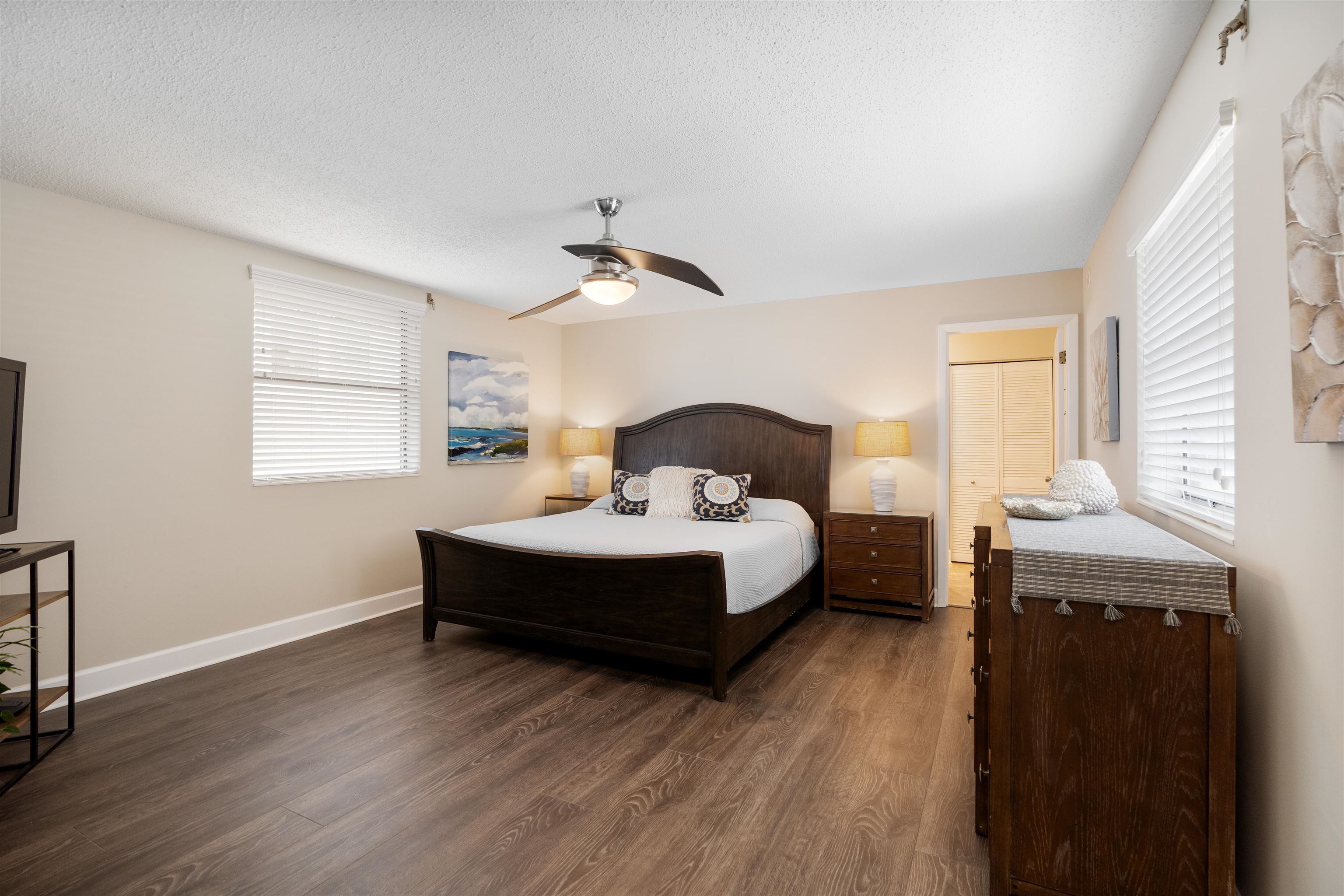 5424 Atlantic View St. Augustine, FL 32080 - Photo 25 of 42 a spacious bedroom with a bed and window