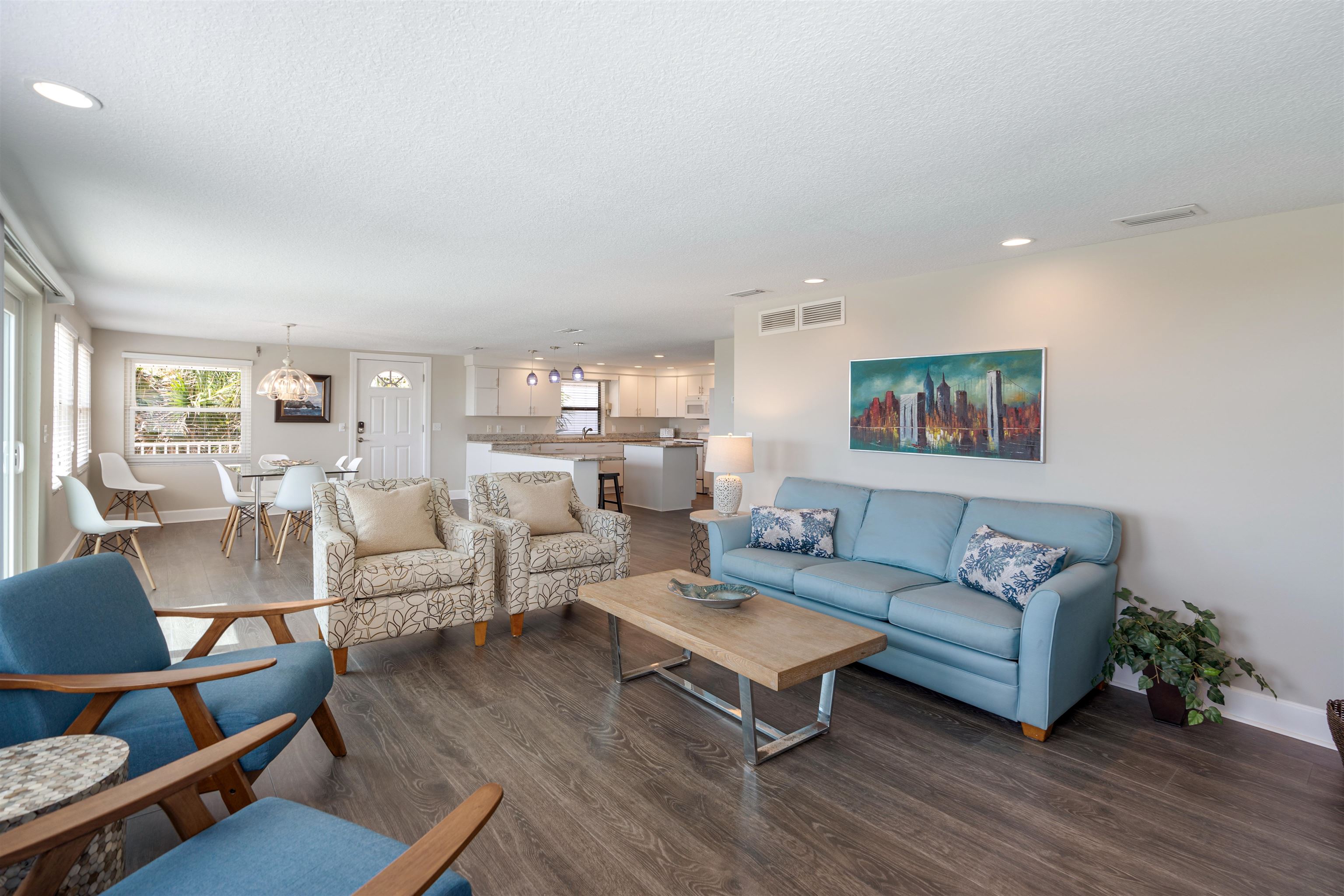 5424 Atlantic View St. Augustine, FL 32080 - Photo 6 of 42 a living room with furniture wooden floor and a table