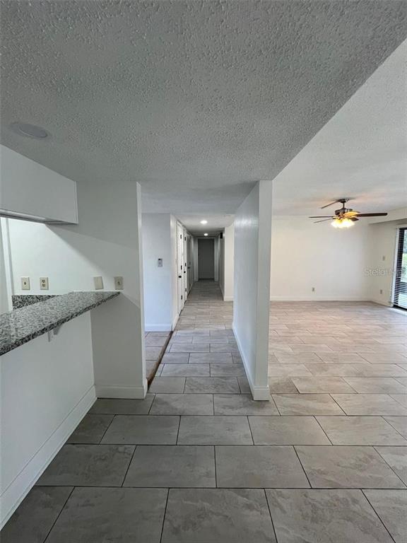 2220 Burnway Road, Unit 2220 Haines City, FL 33844 - Photo 11 of 16 a view of entryway with kitchen