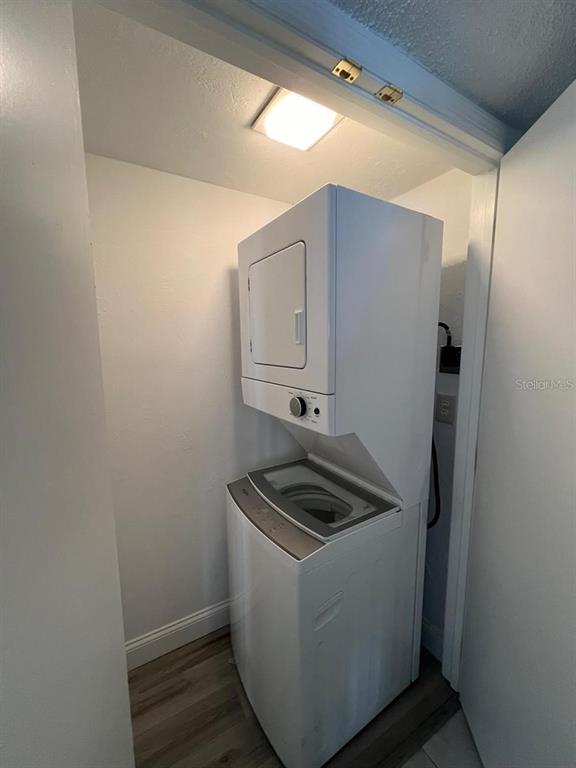 2220 Burnway Road, Unit 2220 Haines City, FL 33844 - Photo 13 of 16 a utility room with dryer and washer