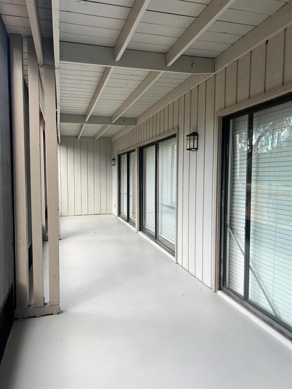 2220 Burnway Road, Unit 2220 Haines City, FL 33844 - Photo 14 of 16 a view of an empty room with wooden floor