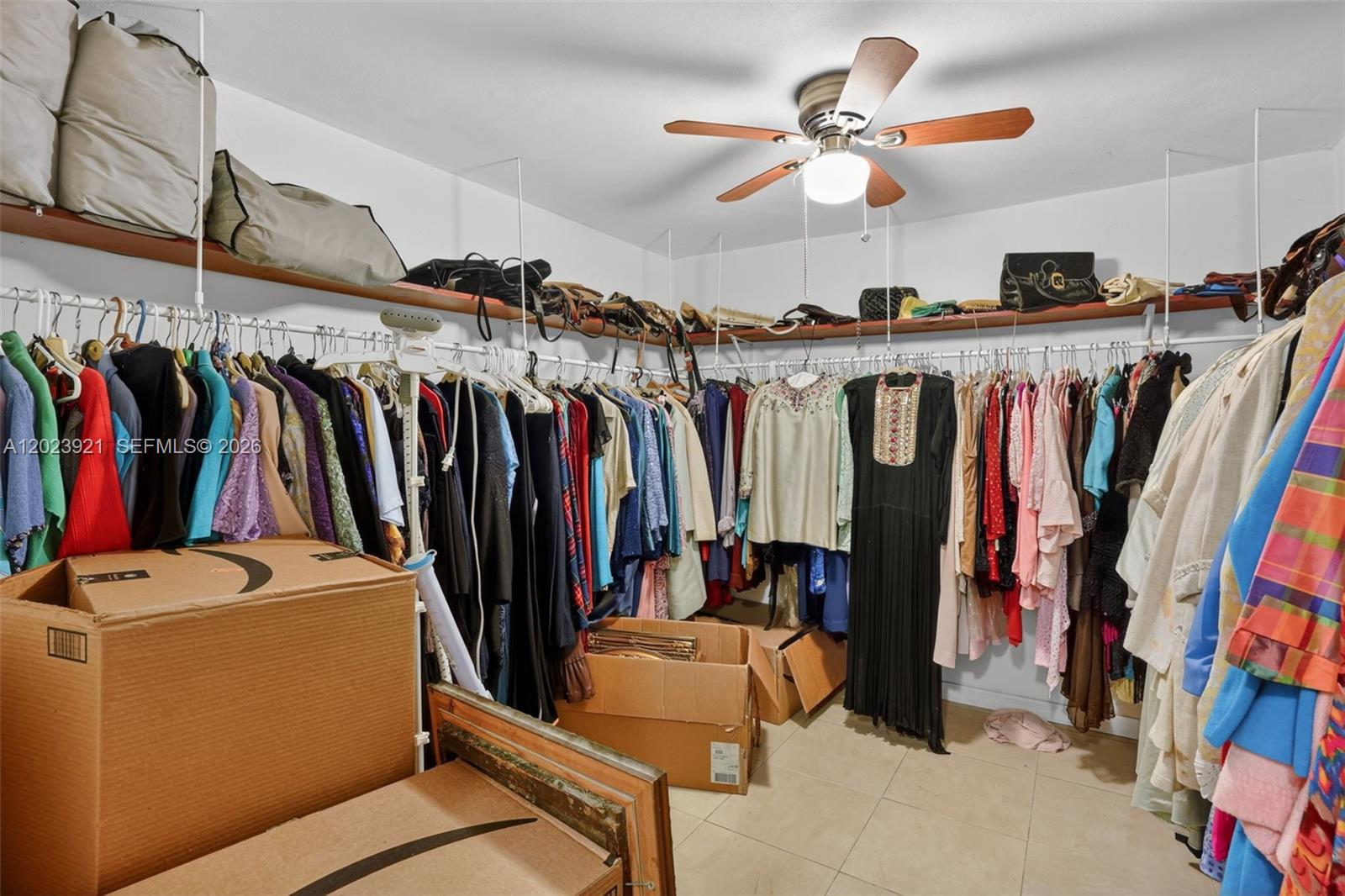 8461 Southwest 68th St Road Miami, FL 33143 - Photo 60 of 65 a view of walk in closet with clothes