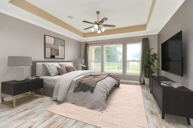 a spacious bedroom with a large bed and a flat screen tv