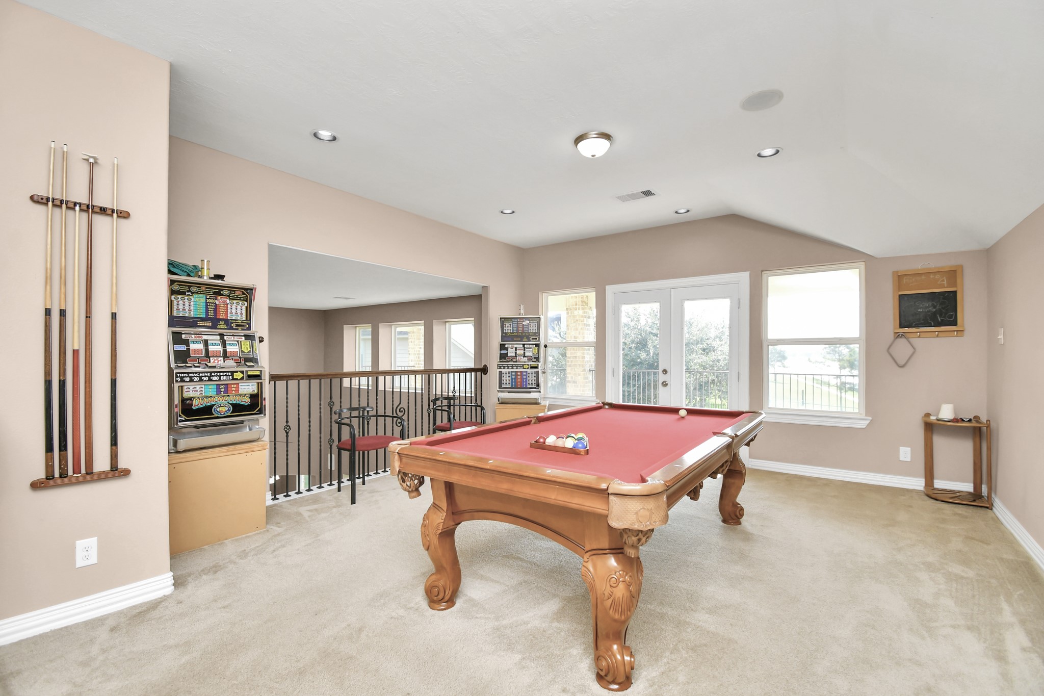 9511 Emerald Lakes Drive Rosharon, TX 77583 - Photo 29 of 38 a room with pool table and windows