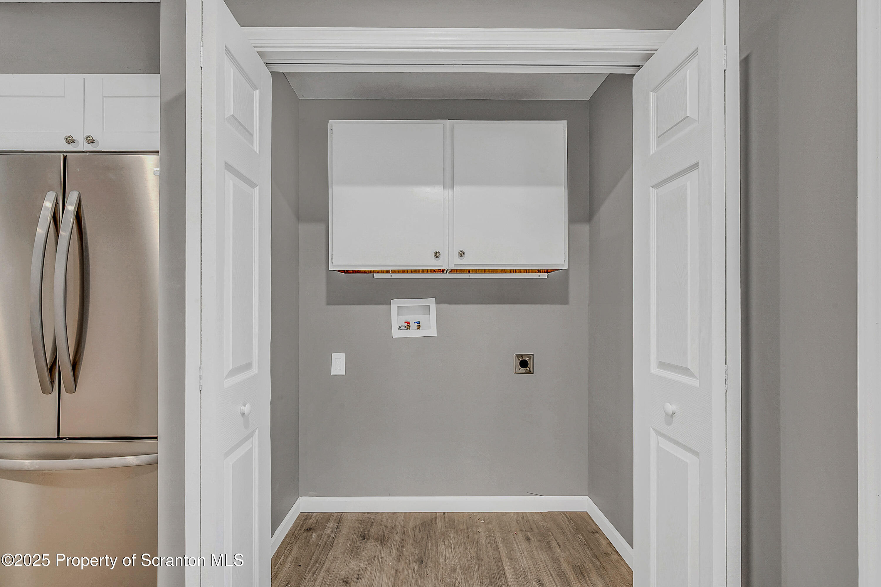 206 Gardner Street Moscow, PA 18444 - Photo 15 of 50 a view of walk in closet with wooden floor