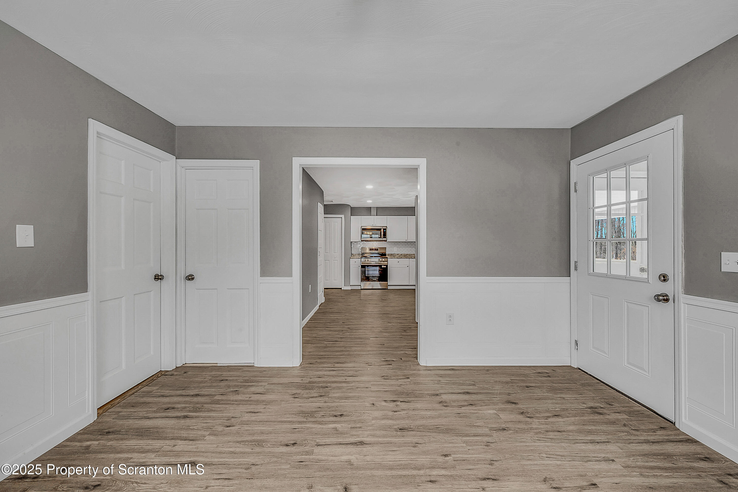 206 Gardner Street Moscow, PA 18444 - Photo 18 of 50 a view of a room with wooden floor and a window