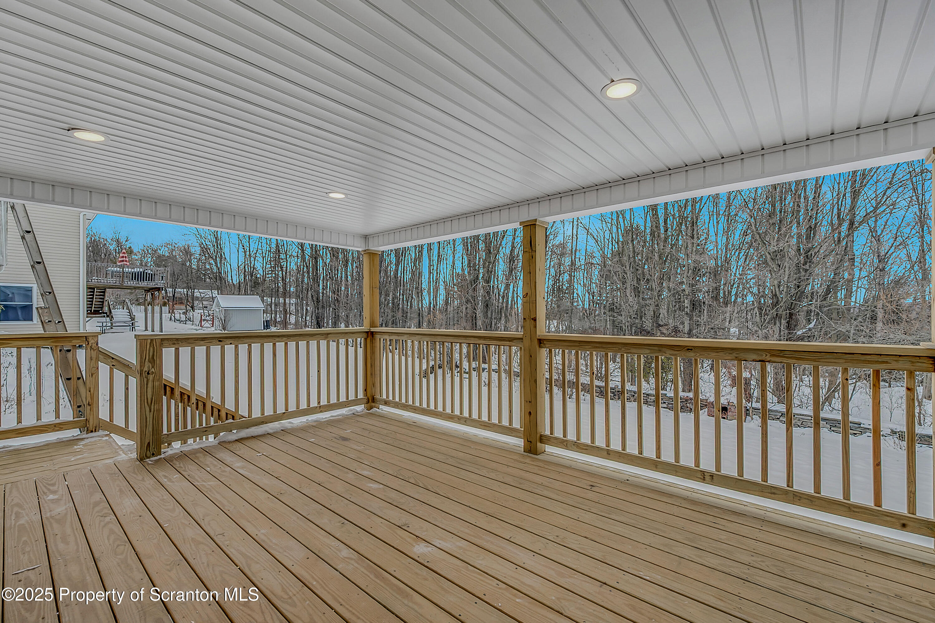 206 Gardner Street Moscow, PA 18444 - Photo 47 of 50 a view of a balcony with wooden floor
