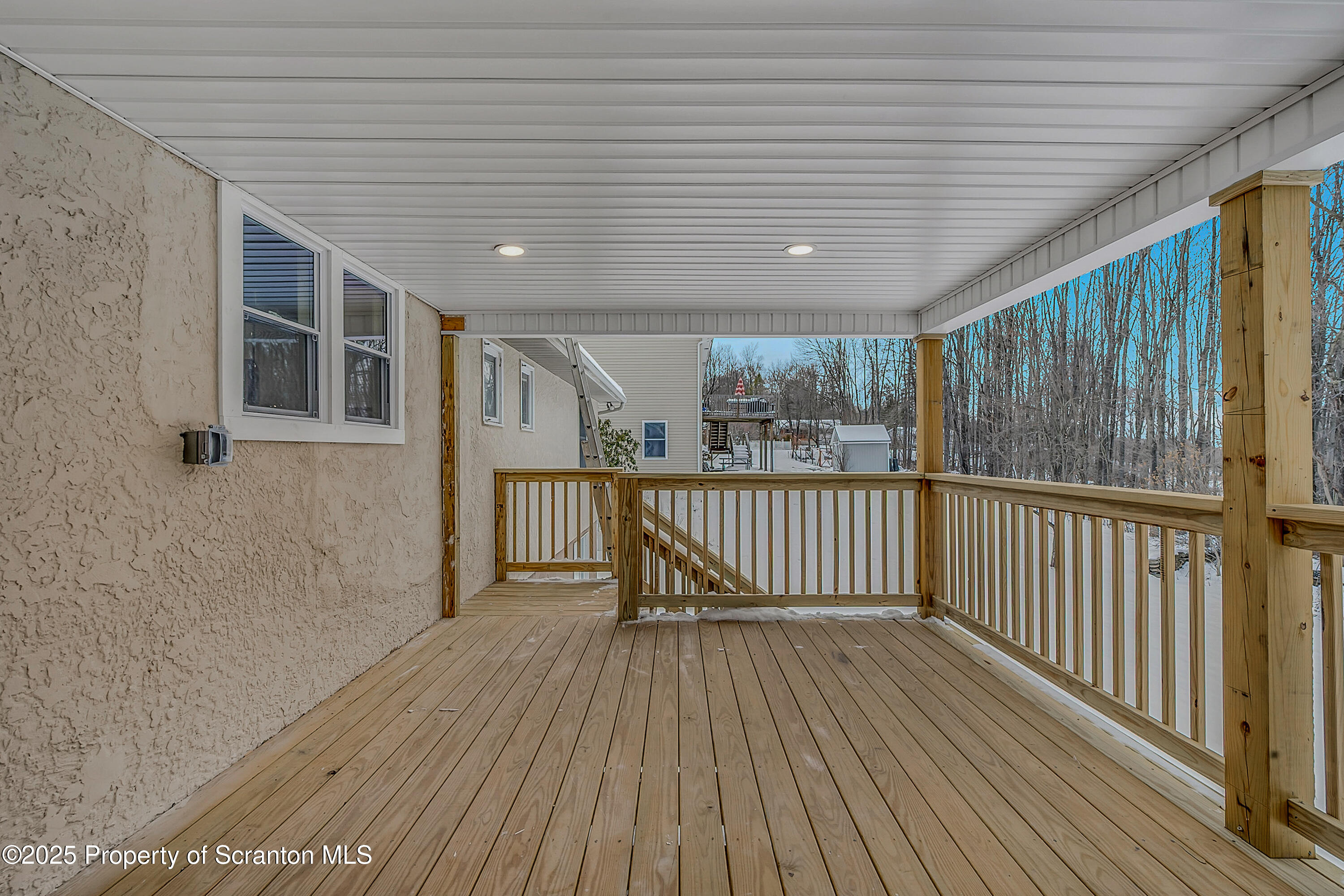 206 Gardner Street Moscow, PA 18444 - Photo 48 of 50 a view of a porch with wooden floor