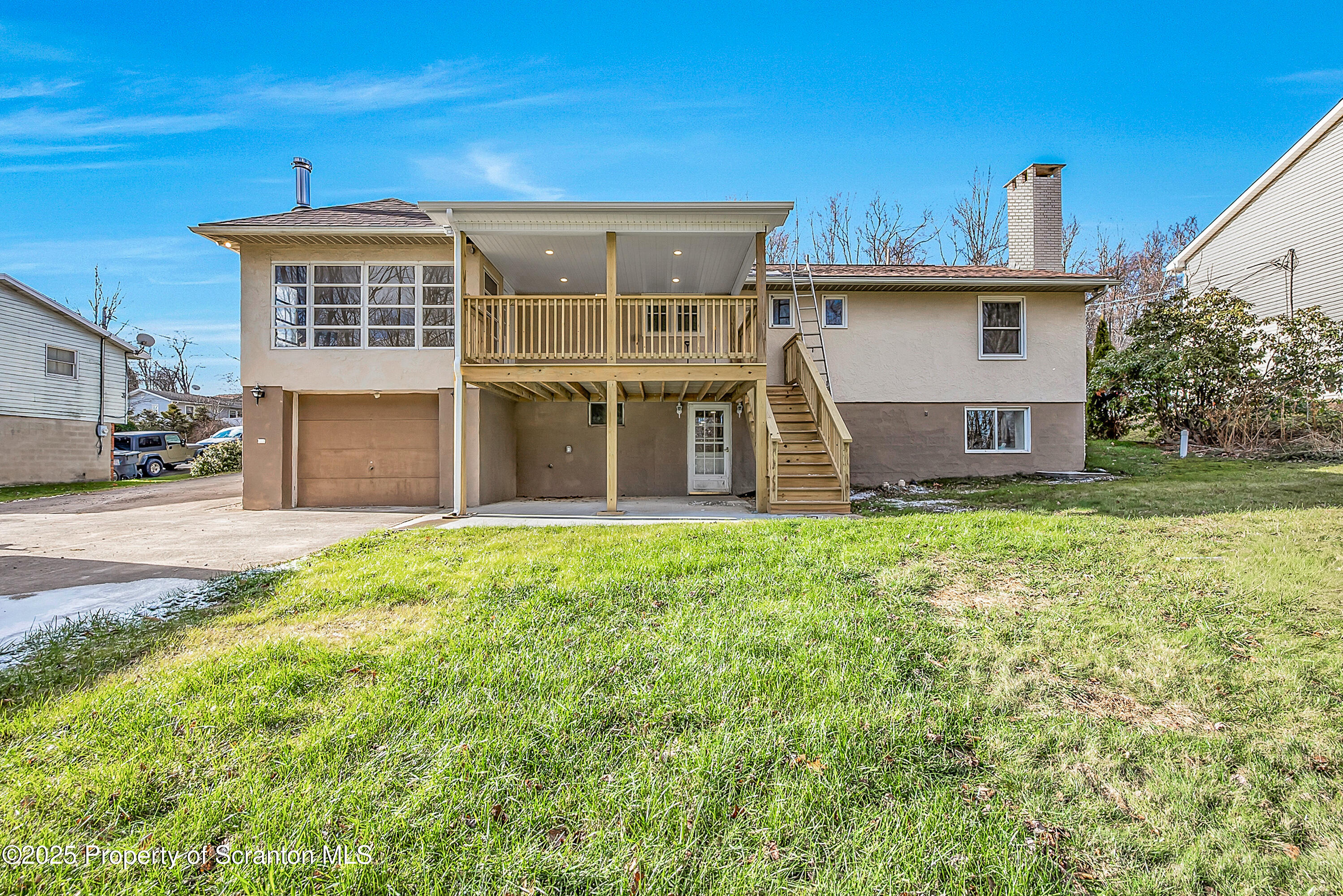 206 Gardner Street Moscow, PA 18444 - Photo 5 of 50 a view of a house with a yard
