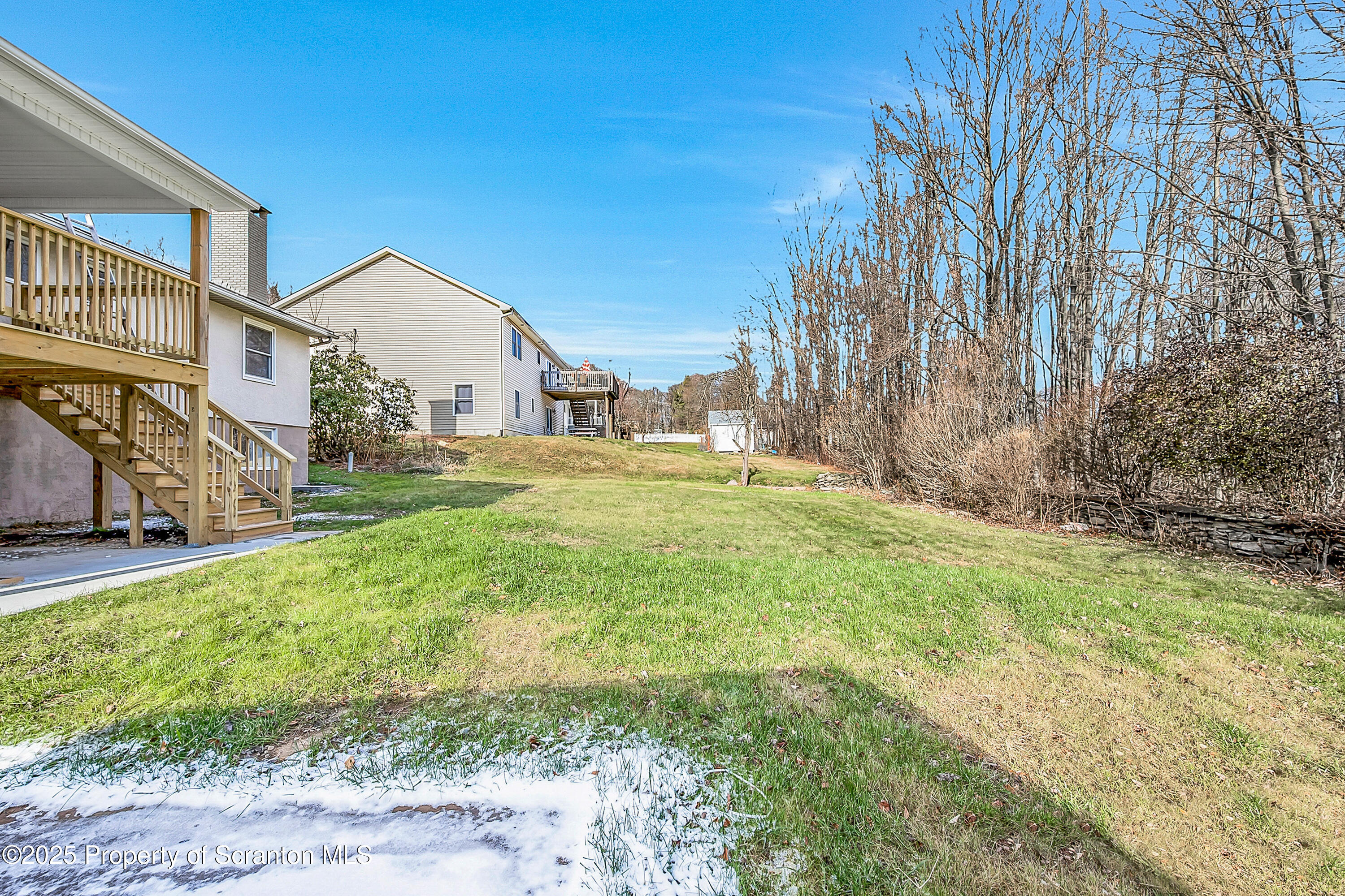 206 Gardner Street Moscow, PA 18444 - Photo 8 of 50 a view of a back yard of the house