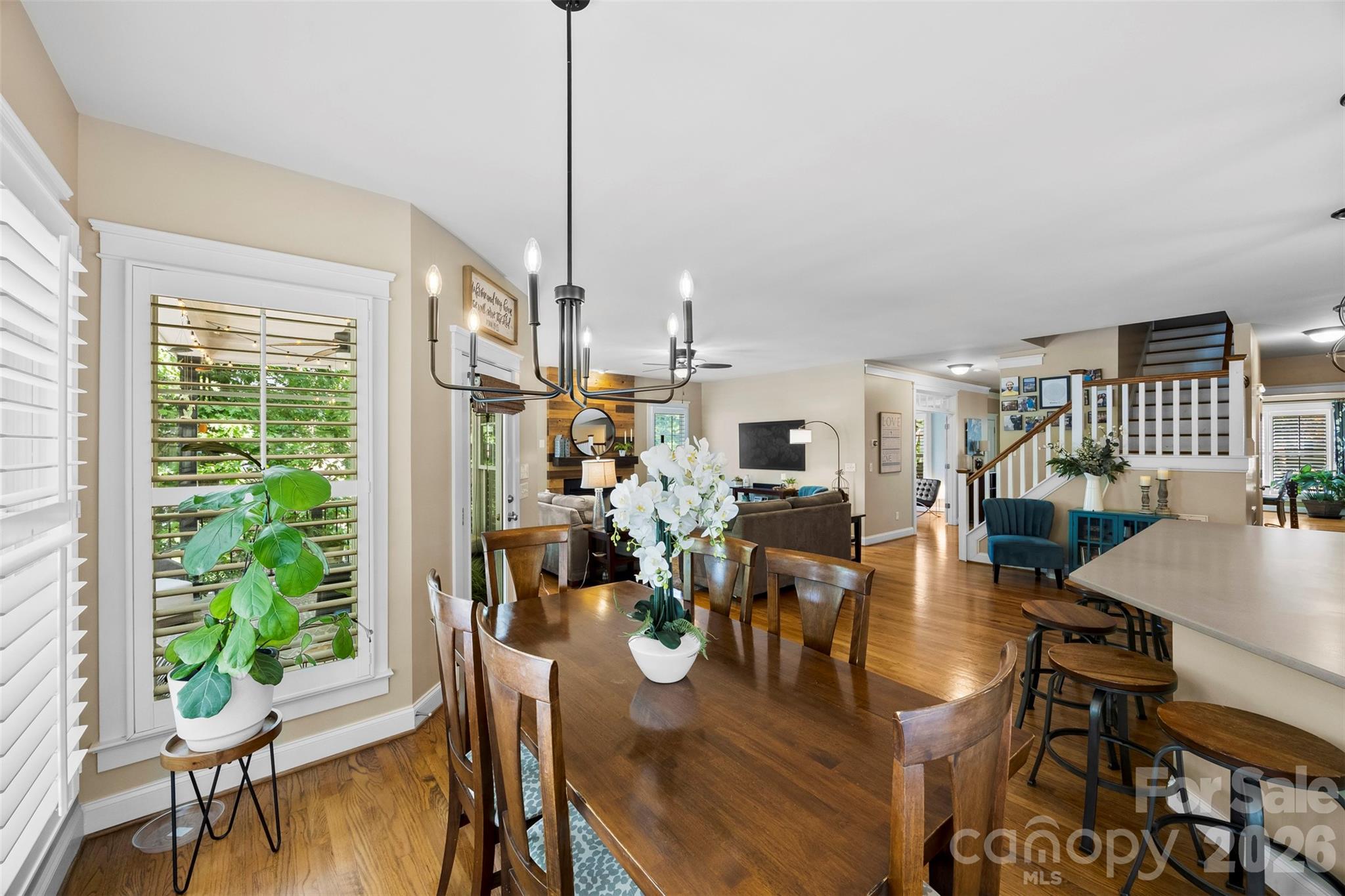 606 Andover Lane Tega Cay, SC 29708 - Photo 15 of 48 a view of a dining room with furniture window and wooden floor