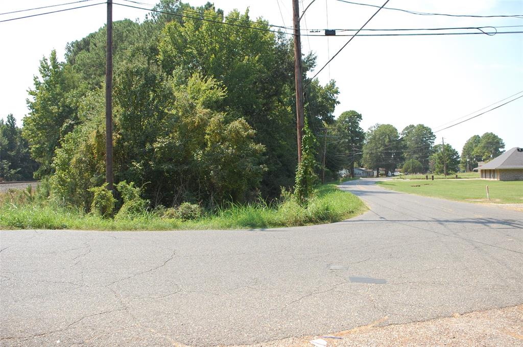 0 Old Mansfield Road Shreveport, LA 71118 - Photo 11 of 12 a view of a road with a yard and large trees