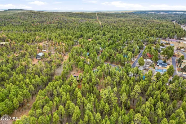 a picture of a bench in front of building