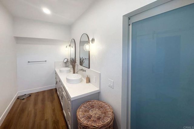 a bedroom with a bed and a closet