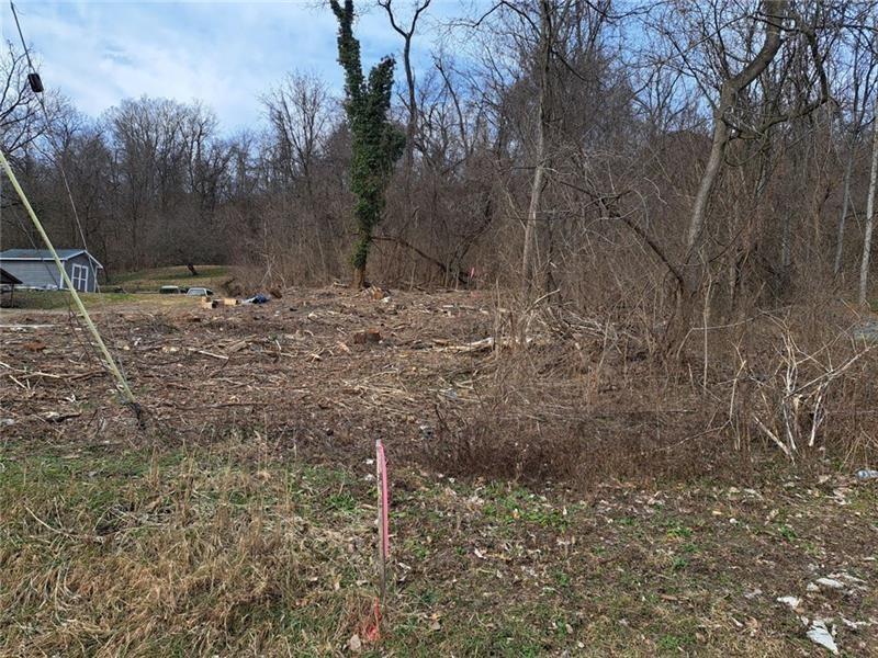 a view of a backyard of the house