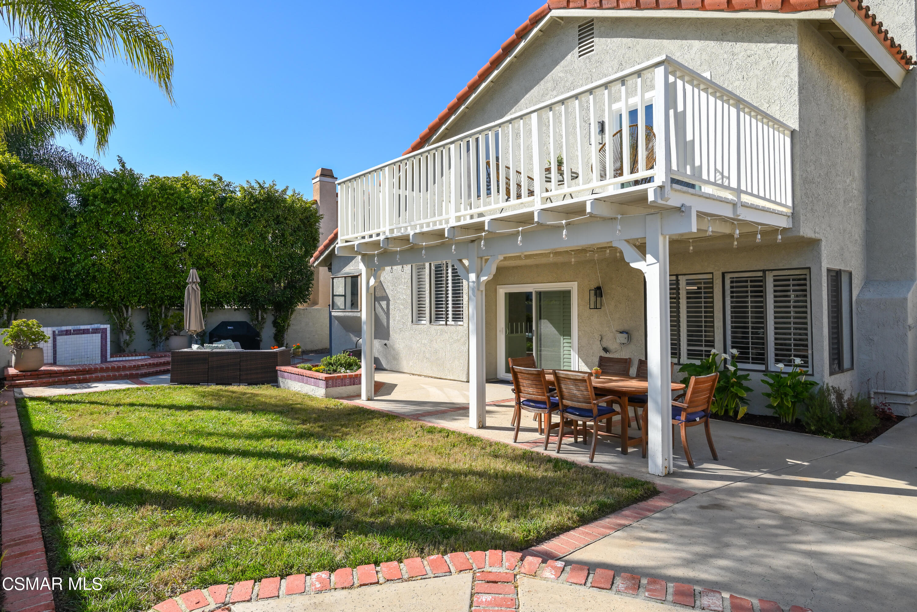 12462 Spring Creek Road Moorpark, CA 93021 - Photo 5 of 57 a view of a house with backyard porch and sitting area