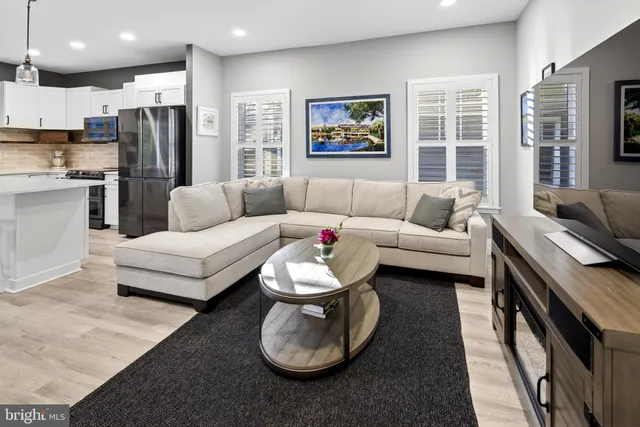 a kitchen with cabinets and a wooden floors