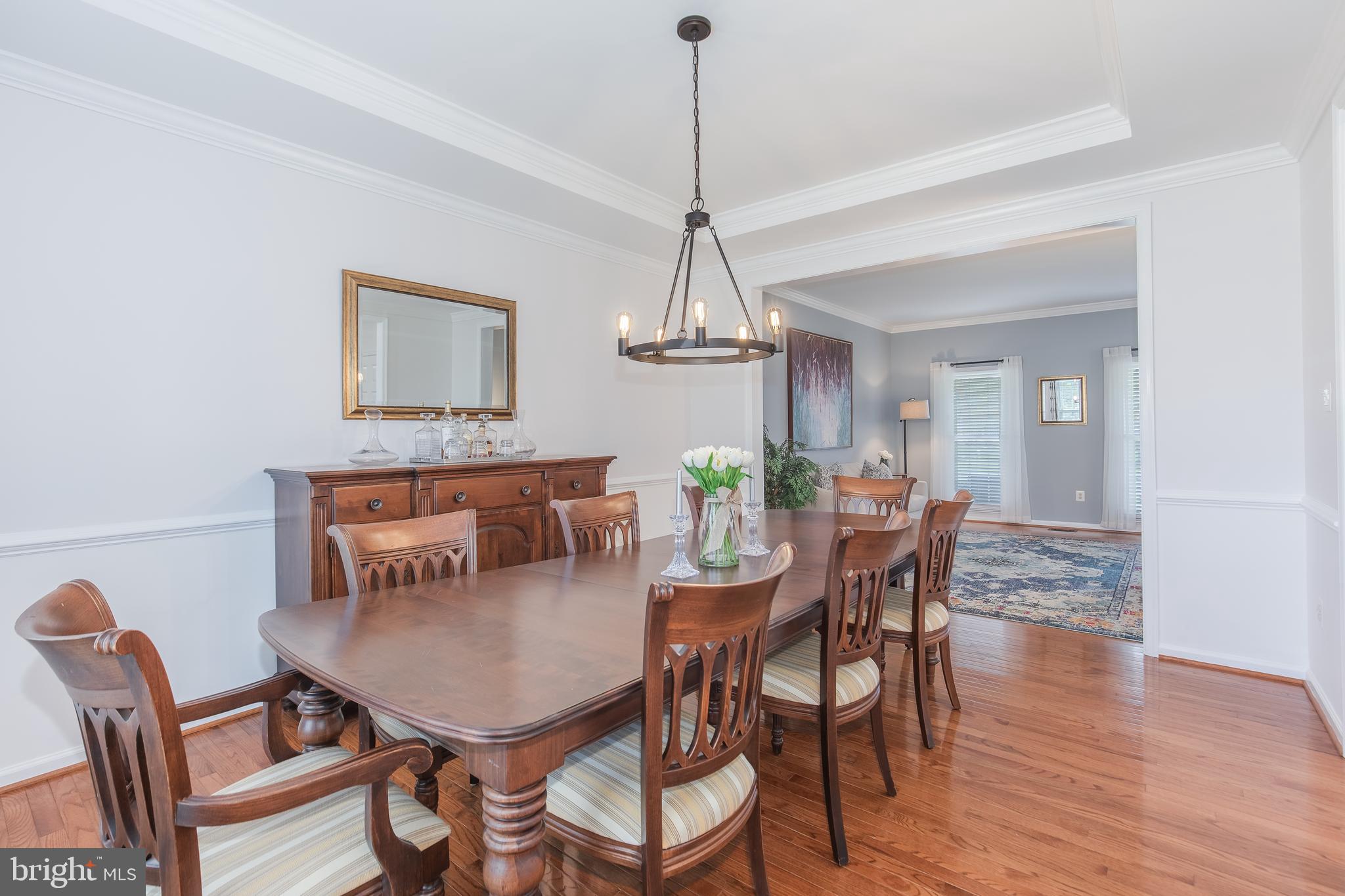 18302 Clear Smoke Road Boyds, MD 20841 - Photo 18 of 64 Dining Room with Chair and Crown Molding