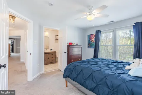 a view of an empty room with a cabinet