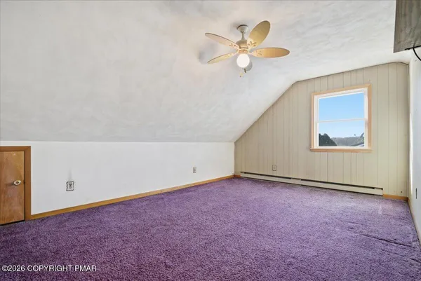 a view of a room with an empty space