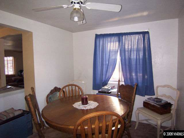 1620 Trainer Way Reno, NV 89512 - Photo 3 of 9 a view of a dining room with furniture and chandelier